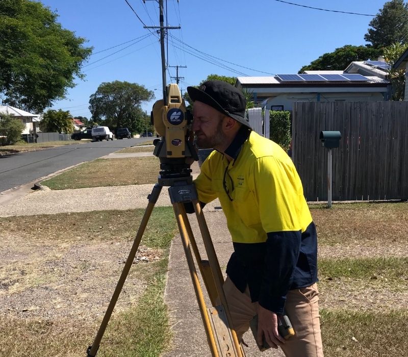 Man surveying property.