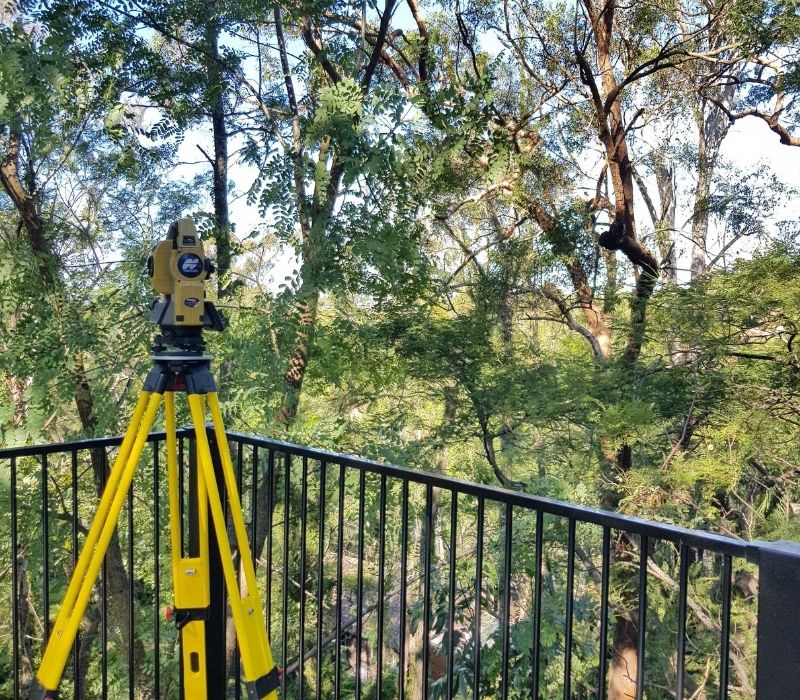 Surveying from verandah.